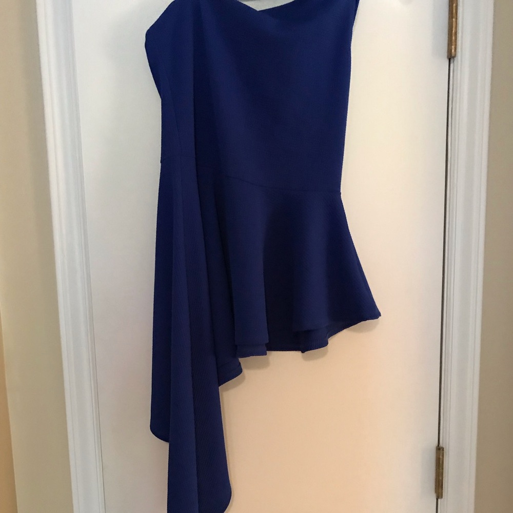 Woman’s asymmetrical top